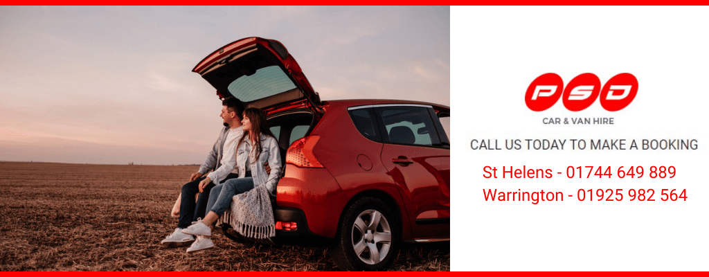 Couple using hire car in the autumn