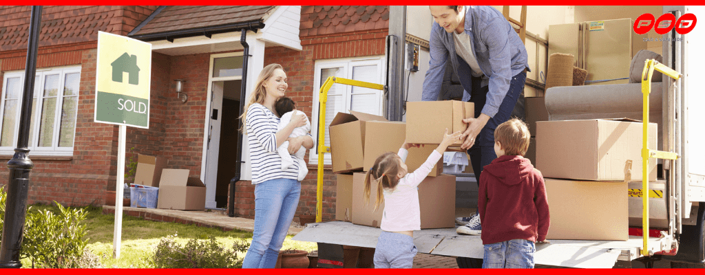 Family moving house with hire van